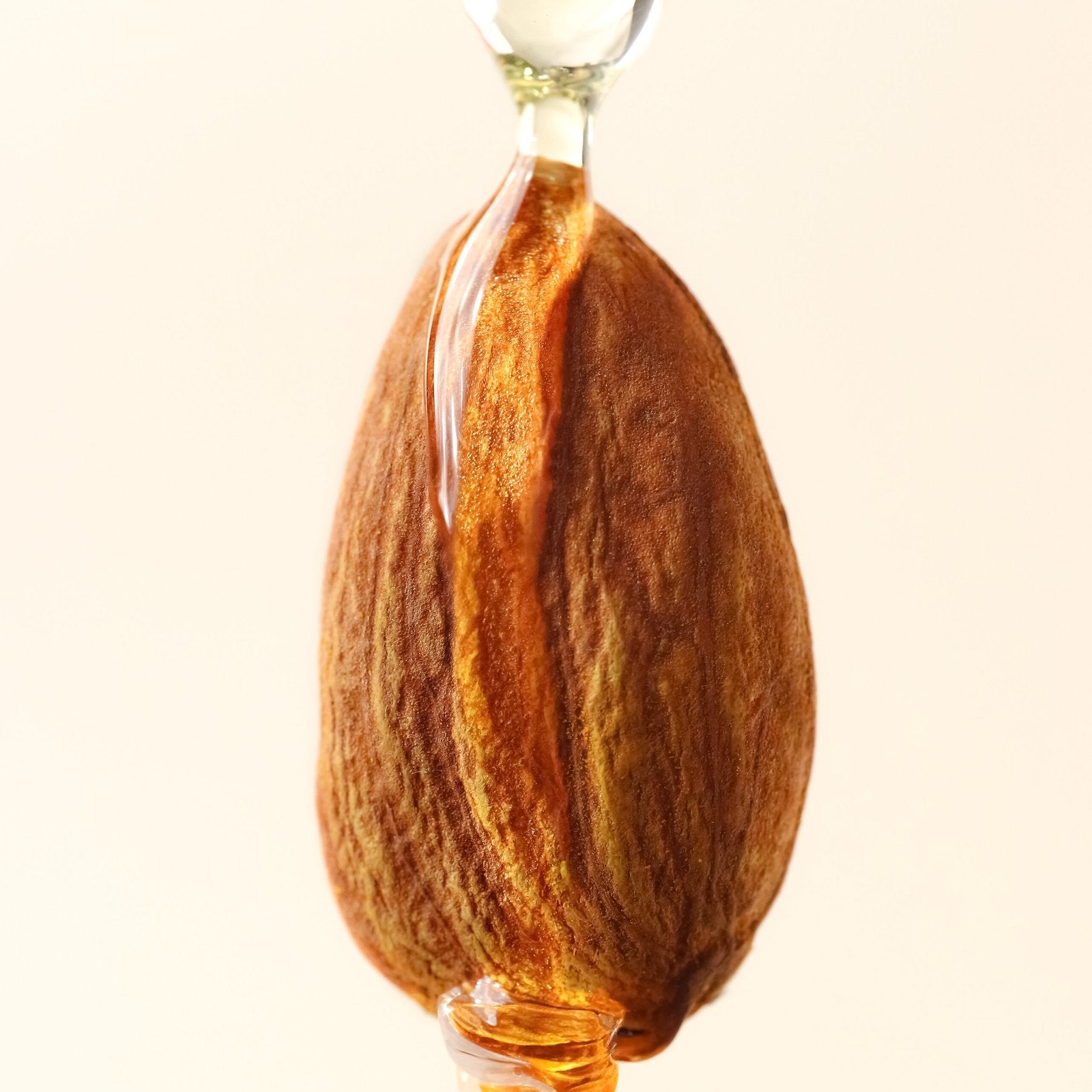 Almond and golden cold-pressed oil